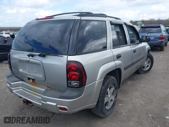 2005 Chevrolet TrailBlazer LT with VIN 1GNDT13S552190909, listed as a IAAI auction lot 42081094 with 117,897 mi miles and . Bid and sale history available at DreamBid. Image 4.