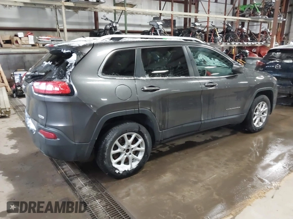 2014 Jeep Cherokee Latitude with VIN 1C4PJMCS0EW213826, listed as a IAAI auction lot 41322537 with 272,659 mi miles and . Bid and sale history available at DreamBid. Image 4.