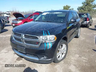 2013 Dodge Durango Crew z VIN 1C4RDJDG9DC677142, wystawiony jako IAAI lot #41834251 z przebiegiem 138 307 mil mil oraz . Historia ofert i sprzedaży dostępna na DreamBid. Obrazek 2.
