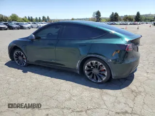 2022 Tesla Model Y Performance z VIN 7SAYGDEF2NF573979, wystawiony jako Copart lot #57778265 z przebiegiem 49 232 mil mil oraz Szkoda całkowita • Salvage title. Historia ofert i sprzedaży dostępna na DreamBid. Obrazek 2.