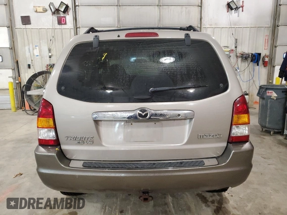 2001 Mazda Tribute LX with VIN 4F2CU08101KM05943, listed as a Copart auction lot 84077694 with 137,937 mi miles and Salvage Title. Bid and sale history available at DreamBid. Image 6.