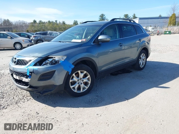2012 Mazda CX-9 Touring with VIN JM3TB3CV7C0361690, listed as a IAAI auction lot 41804539 with 133,861 mi miles and . Bid and sale history available at DreamBid. Image 2.