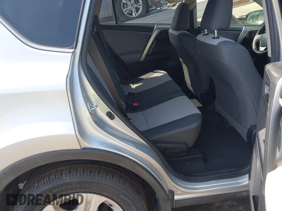 2014 Toyota RAV4 LE with VIN JTMBFREV7ED050667, listed as a IAAI auction lot 42082759 with 270,927 mi miles and . Bid and sale history available at DreamBid. Image 8.
