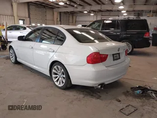 2011 BMW 3 Series 328i with VIN WBAPH7G55BNN02281, listed as a IAAI auction lot 41357797 with 118,224 mi miles. Bid and sale history available at carsss.com. Image 3.