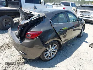 2017 Mazda 3 Grand Touring z VIN 3MZBN1M39HM127811, wystawiony jako IAAI lot #42060315 z przebiegiem Nie podano mil oraz . Historia ofert i sprzedaży dostępna na DreamBid. Obrazek 4.