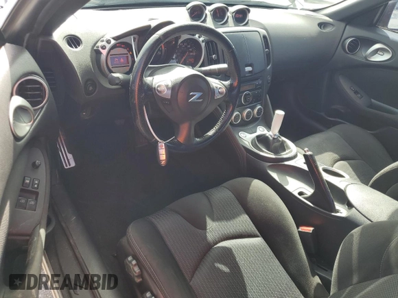 2010 Nissan 370Z Touring with VIN JN1AZ4EH2AM506507, listed as a Copart auction lot 70469504 with 115,594 mi miles and Salvage Title. Bid and sale history available at carsss.com. Image 8.