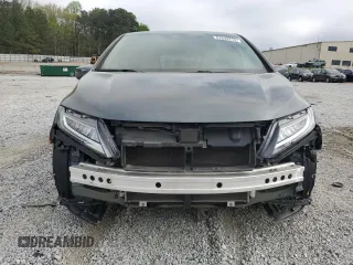 2018 Honda Odyssey Touring with VIN 5FNRL6H8XJB071561, listed as a Copart auction lot 51842215 with 63,828 mi miles and Salvage Title. Bid and sale history available at carsss.com. Image 5.