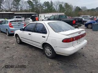 1996 Nissan Sentra XE z VIN 1N4AB41D0TC763104, wystawiony jako IAAI lot #41303640 z przebiegiem 307 682 mil mil oraz . Historia ofert i sprzedaży dostępna na DreamBid. Obrazek 3.