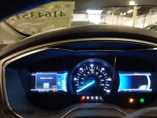 2014 Ford Fusion SE Hybrid with VIN 3FA6P0LU8ER151329, listed as a IAAI auction lot 41643515 with 121,161 mi miles. Bid and sale history available at carsss.com. Image 7.