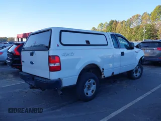 2008 Ford F-150 XL with VIN 1FTRF14W98KB87331, listed as a IAAI auction lot 40583789 with 106,402 mi miles. Bid and sale history available at carsss.com. Image 4.