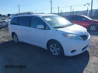2014 Toyota Sienna LE AAS with VIN 5TDKK3DC6ES489789, listed as a IAAI auction lot 41899933 with 81,090 mi miles. Bid and sale history available at carsss.com. Image 1.