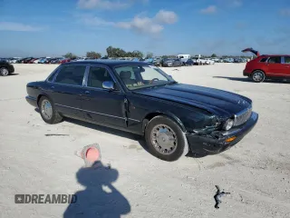 2001 Jaguar XJ Vanden Plas with VIN SAJDA24C51LF38566, listed as a Copart auction lot 43314625 with 100,298 mi miles and Salvage title. Bid and sale history available at DreamBid. Image 4.