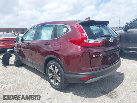 2019 Honda CR-V LX with VIN 2HKRW5H33KH402697, listed as a IAAI auction lot 41942219 with 80,826 mi miles. Bid and sale history available at carsss.com. Image 3.