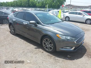 2017 Ford Fusion SE z VIN 3FA6P0HD3HR189144, wystawiony jako IAAI lot #42271155 z przebiegiem 172 146 mil mil oraz . Historia ofert i sprzedaży dostępna na DreamBid. Obrazek 1.