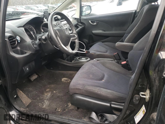 2013 Honda Fit Sport with VIN JHMGE8H54DC033780, listed as a Copart auction lot 79557204 with 67,384 mi miles and Clean Title. Bid and sale history available at carsss.com. Image 7.