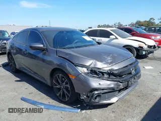 2019 Honda Civic Sport with VIN 2HGFC2F80KH575080, listed as a IAAI auction lot 42316550 with 147,716 mi miles and . Bid and sale history available at DreamBid. Image 1.