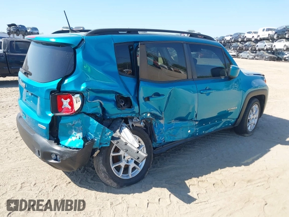 2020 Jeep Renegade Latitude with VIN ZACNJAB10LPM09870, listed as a IAAI auction lot 42063390 with 59,201 mi miles. Bid and sale history available at carsss.com. Image 4.