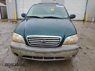 2003 Kia Sedona LX with VIN KNDUP131036440504, listed as a Copart auction lot 45048015 with 75,507 mi miles and Salvage Title. Bid and sale history available at carsss.com. Image 5.