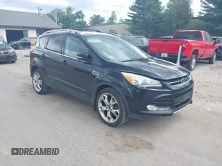 2015 Ford Escape Titanium with VIN 1FMCU9J92FUA96987, listed as a IAAI auction lot 42678423 with 188,956 mi miles and . Bid and sale history available at DreamBid. Image 1.