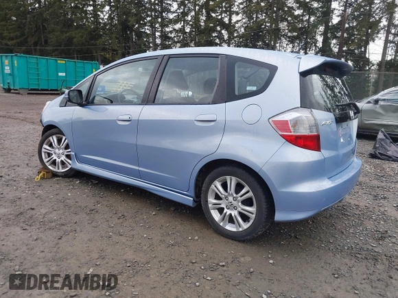 2009 Honda Fit Sport w/Navi with VIN JHMGE886X9S042490, listed as a IAAI auction lot 41931712 with 111,088 mi miles. Bid and sale history available at carsss.com. Image 3.