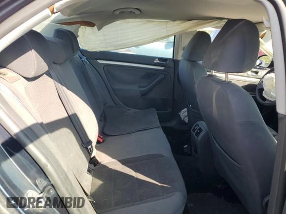 2009 Volkswagen Jetta S с VIN 3VWJM71K69M012386, выставлен на аукционе Copart как лот 52616555 с пробегом 150 322 миль миль и Списание • Salvage title. История ставок и продаж доступна на DreamBid. Изображение 10.