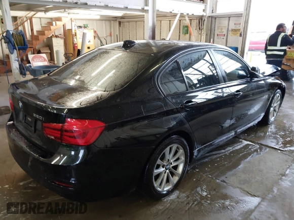 2016 BMW 3 Series 320i with VIN WBA8A9C52GK616953, listed as a IAAI auction lot 41227029 with 73,741 mi miles. Bid and sale history available at carsss.com. Image 4.