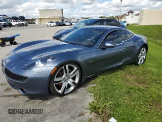 2012 Fisker Karma EcoSport z VIN YH4K14AA3CA001524, wystawiony jako Copart lot #74501534 z przebiegiem 15 969 mil mil oraz Nie do naprawy. Historia ofert i sprzedaży dostępna na DreamBid. Obrazek 1.