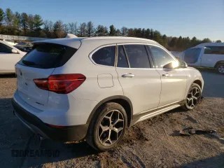 2018 BMW X1 xDrive28i with VIN WBXHT3C38J5L31384, listed as a Copart auction lot 66323172 with 74,272 mi miles. Bid and sale history available at carsss.com. Image 4.