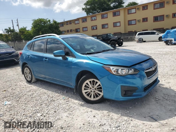 2017 Subaru Impreza Premium with VIN 4S3GTAD65H3703808, listed as a Copart auction lot 57396095 with 68,960 mi miles and Salvage title. Bid and sale history available at DreamBid. Image 4.