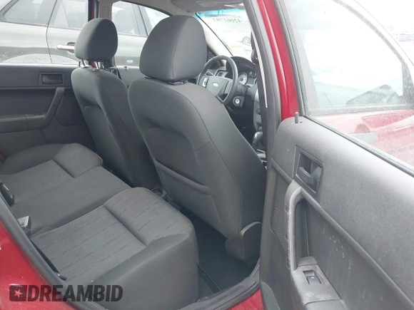 2009 Ford Focus SE with VIN 1FAHP35N09W136732, listed as a IAAI auction lot 42061783 with 143,993 mi miles. Bid and sale history available at carsss.com. Image 8.