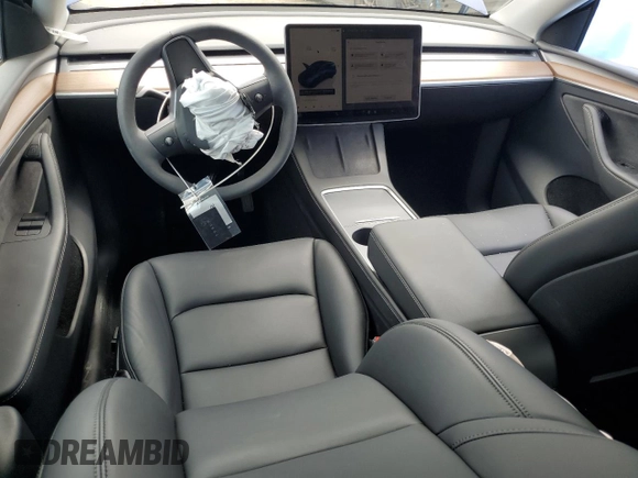 2024 Tesla Model Y Long Range with VIN 7SAYGDEE0RF176672, listed as a Copart auction lot 55622355 with 6,728 mi miles and Salvage title. Bid and sale history available at DreamBid. Image 8.