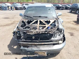 2000 Toyota Avalon XL z VIN 4T1BF28B1YU018225, wystawiony jako IAAI lot #42125483 z przebiegiem 340 207 mil mil oraz . Historia ofert i sprzedaży dostępna na DreamBid. Obrazek 12.