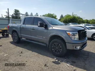 2018 Nissan Titan SV with VIN 1N6AA1E50JN514802, listed as a Copart auction lot 62342875 with 101,593 mi miles and Salvage title. Bid and sale history available at DreamBid. Image 4.