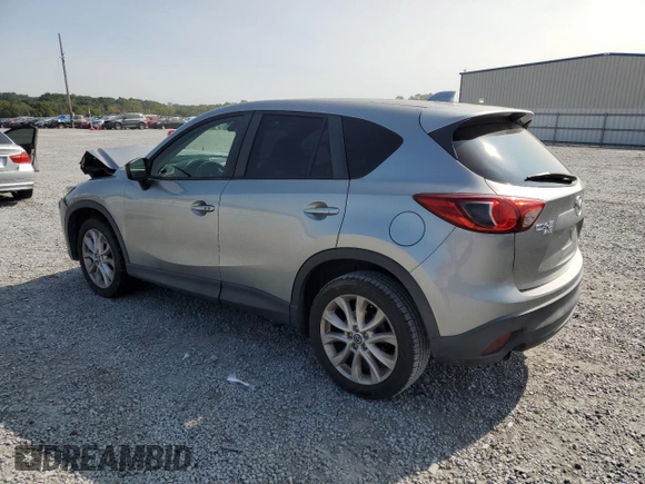 2015 Mazda CX-5 Grand Touring with VIN JM3KE4DY8F0540181, listed as a Copart auction lot 70624394 with 119,420 mi miles and Salvage Title. Bid and sale history available at carsss.com. Image 2.