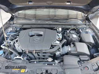 2024 Mazda 3 S with VIN 3MZBPAAM4RM423330, listed as a IAAI auction lot 41582454 with 12,604 mi miles and . Bid and sale history available at DreamBid. Image 10.