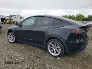 2022 Tesla Model Y Long Range z VIN 7SAYGDEE2NF313492, wystawiony jako Copart lot #55748695 z przebiegiem Nie podano mil oraz Szkoda całkowita • Salvage title. Historia ofert i sprzedaży dostępna na DreamBid. Obrazek 2.
