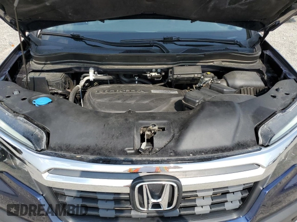 2019 Honda Ridgeline RTL-T with VIN 5FPYK3F69KB033438, listed as a Copart auction lot 59023585 with 82,856 mi miles and Salvage title. Bid and sale history available at DreamBid. Image 11.