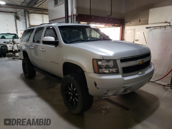 2011 Chevrolet Suburban LT z VIN 1GNSKJE34BR341094, wystawiony jako Copart lot #53376515 z przebiegiem 187 219 mil mil oraz Czysty tytuł • Clean title. Historia ofert i sprzedaży dostępna na DreamBid. Obrazek 4.
