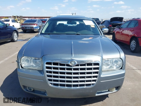 2006 Chrysler 300 C with VIN 2C3KA63H56H313967, listed as a IAAI auction lot 42056998 with 143,592 mi miles and . Bid and sale history available at carsss.com. Image 12.