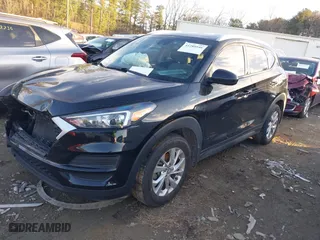2021 Hyundai Tucson Value with VIN KM8J33A40MU302574, listed as a IAAI auction lot 41289546 with 94,614 mi miles. Bid and sale history available at carsss.com. Image 17.