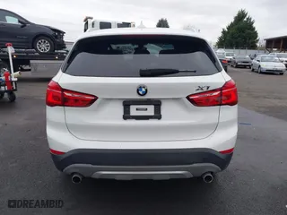 2018 BMW X1 sDrive28i with VIN WBXHU7C32J5H44246, listed as a IAAI auction lot 41477050 with 69,858 mi miles. Bid and sale history available at carsss.com. Image 16.
