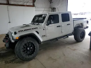 2020 Jeep Gladiator Rubicon with VIN 1C6JJTBG4LL102523, listed as a Copart auction lot 54735955 with 104,579 mi miles and Salvage title. Bid and sale history available at DreamBid. Image 1.