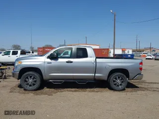 2014 Toyota Tundra 4WD Truck SR with VIN 5TFUW5F12EX379093, listed as a IAAI auction lot 41730439 with 133,409 mi miles. Bid and sale history available at carsss.com. Image 14.