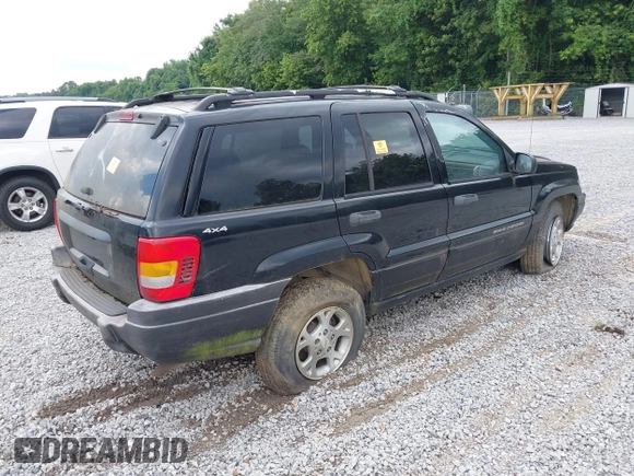 1999 Jeep Grand Cherokee Laredo with VIN 1J4GW58S0XC524798, listed as a IAAI auction lot 42761040 with 173,792 mi miles and . Bid and sale history available at DreamBid. Image 4.