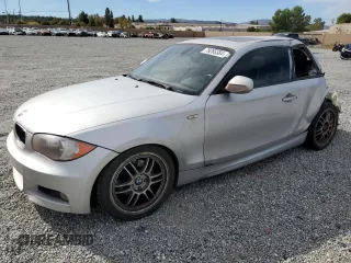 2011 BMW 1 Series 128i with VIN WBAUP7C53BVM54792, listed as a Copart auction lot 79266384 with Not Provided miles and Salvage Title. Bid and sale history available at DreamBid. Image 1.