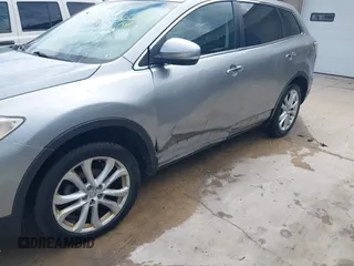 2011 Mazda CX-9 Grand Touring with VIN JM3TB2DA3B0300342, listed as a IAAI auction lot 42588973 with 224,420 mi miles and . Bid and sale history available at DreamBid. Image 6.