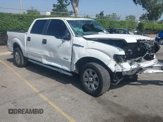2014 Ford F-150 XL with VIN 1FTFW1CTXEFC00103, listed as a IAAI auction lot 42462361 with 189,745 mi miles and . Bid and sale history available at DreamBid. Image 1.