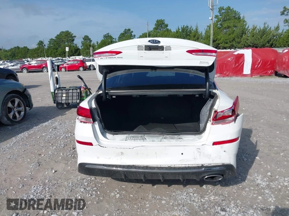 2020 Kia Optima LX with VIN 5XXGT4L30LG390927, listed as a IAAI auction lot 42642424 with 84,697 mi miles and . Bid and sale history available at DreamBid. Image 16.