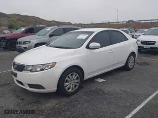 2012 Kia Forte EX with VIN KNAFU4A27C5516687, listed as a IAAI auction lot 41778516 with 255,773 mi miles. Bid and sale history available at carsss.com. Image 2.