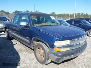 1999 Chevrolet Silverado 1500 LS with VIN 2GCEC19V1X1144026, listed as a IAAI auction lot 41398552 with 216,068 mi miles. Bid and sale history available at carsss.com. Image 1.